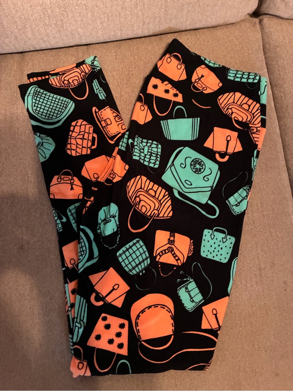 LuLaRoe Black Leggings with Teal & Orange Purse Print